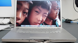 MacBook Pro Takes a Cap for its Owner, Still Boots Up